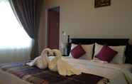 Kamar Tidur 6 Cozy Boutique Hotel