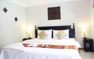 Kamar Tidur 3 Cozy Boutique Hotel