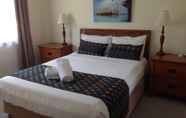 Kamar Tidur 7 Palm View Holiday Apartments