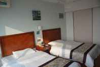 ห้องนอน GreenTree Inn Weihai North Qingdao Road Express Hotel