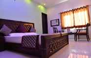 Kamar Tidur 4 Hotel Amax Inn