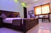 Kamar Tidur Hotel Amax Inn