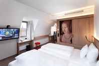 Bedroom Sorat Hotel Saxx Nürnberg