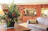 Lobby Coast Grimshaw Hotel & Suites