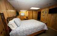 Kamar Tidur 2 Log Cabin Lodge & Suites