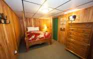 Kamar Tidur 6 Log Cabin Lodge & Suites