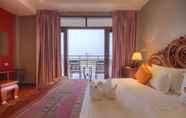 Bedroom 5 Le Grand Mekong Hotel
