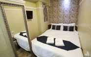 Kamar Tidur 7 Grand Inn