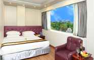 Kamar Tidur 4 Hotel Grand United Ahlone Branch