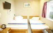 Kamar Tidur 3 Kam Fu Guest House