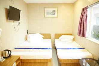 Kamar Tidur 4 Kam Fu Guest House