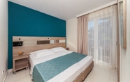 Kamar Tidur 7 Apartments Katoro Plava Laguna