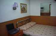 Kamar Tidur 2 Guangdong Guest House