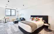 Kamar Tidur 4 Roomie Apartment Hotel