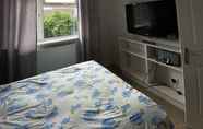 Bedroom 3 Immaculate 2-bed Apartment in Isleworth by River