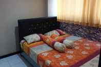 Kamar Tidur THE ROOMOS Hotel Apartemen