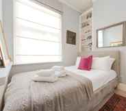 Bedroom 4 Charming Flat in Leafy West London by Underthedoormat