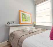 Bedroom 3 Charming Flat in Leafy West London by Underthedoormat