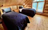 Bedroom 3 Luxury Log Chalet | Pool + Private HotTub | Ski In/Out | Overlooking Greywolf GC