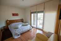 ห้องนอน Hotel de Cerva