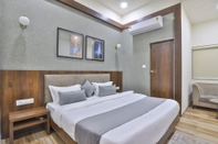 Kamar Tidur Hotel SR Regency