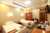 ห้องนอน One Myanmar Resort Pathein