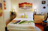 Phòng ngủ 2 Kokomo Inn - Tropical Riverfront B&B