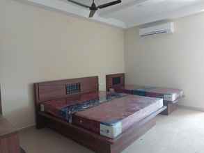 Bedroom 4 Hotel Santhosh Inn