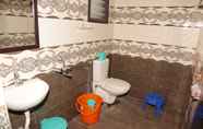 In-room Bathroom 6 Hotel Santhosh Inn
