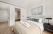 Kamar Tidur 3 Deluxe two Bedroom Apartment in Londons Canary Wharf