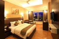 Bedroom Nandan Kanan-M Square Hotels and Resorts