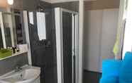 In-room Bathroom 3 Smartsuite Apartment With Terrace in Stresa