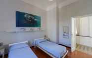 Bedroom 2 Rebecca Apartment Furnished With Taste in Stresa City Center