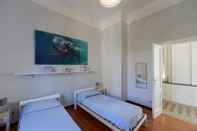 Bedroom Rebecca Apartment Furnished With Taste in Stresa City Center