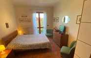 Bedroom 6 Chalet Dania With Garden Pool and View of the Lake Maggiore