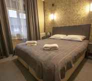 Kamar Tidur 6 Ares Business Suit Hotel