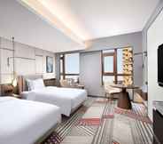 Bedroom 7 Ramada Plaza by Wyndham Poyang