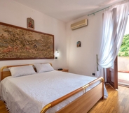 Kamar Tidur 7 Casa Janas in Sedini