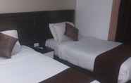 Bedroom 5 Gardenia Hotel