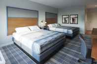 ห้องนอน AmericInn by Wyndham International Falls