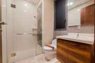 In-room Bathroom Elegant And Comfy 1Br At Marigold Nava Park Apartment