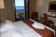 ห้องนอน Hotel Calabona