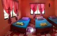 Bedroom 2 Villa Filipinas Resort Tayug by Cocotel