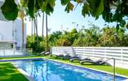 Lain-lain 7 Sanders Rio Gardens - Dreamy 1-bedroom Apartment With Shared Pool and Balcony