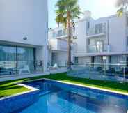 Others 5 Sanders Rio Gardens - Dreamy 1-bedroom Apartment With Shared Pool and Balcony