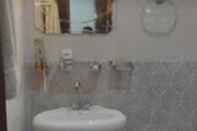 In-room Bathroom New Hajveri Hotel Lahore