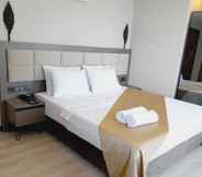 ห้องนอน 4 Magia Hotel