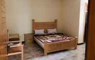 Kamar Tidur 4 Grand Shafaat Hotel Nathiagali