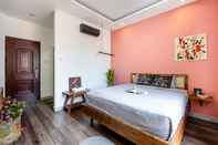 Bedroom HoLo Central Saigon - Serviced HomeStay