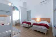 Kamar Tidur Lagoa Hostel & Suites